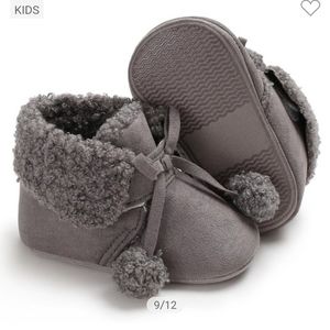 Gray boots with balls